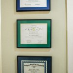 Credentials hanging on the wall