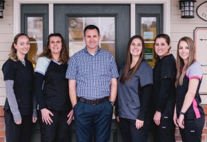 Staff posing together in the office