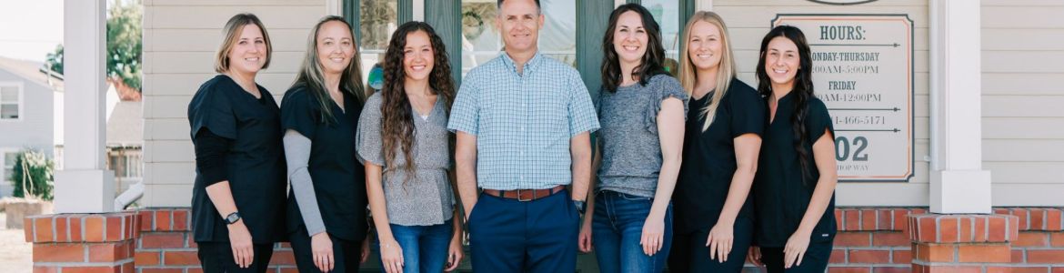 {LAST_NAME} and his Dental Team